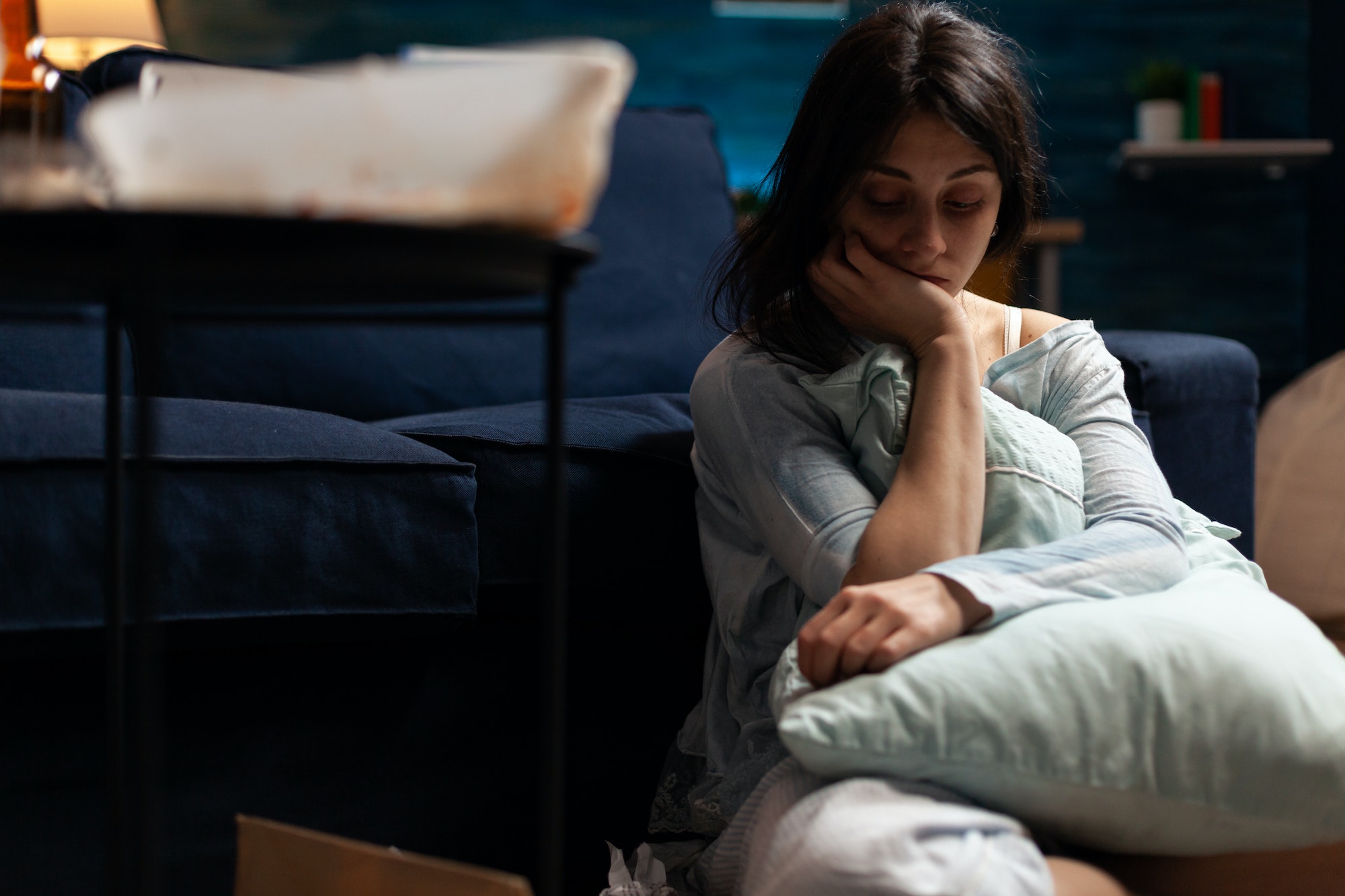 Suicidal depressed person in pain and solitude at home