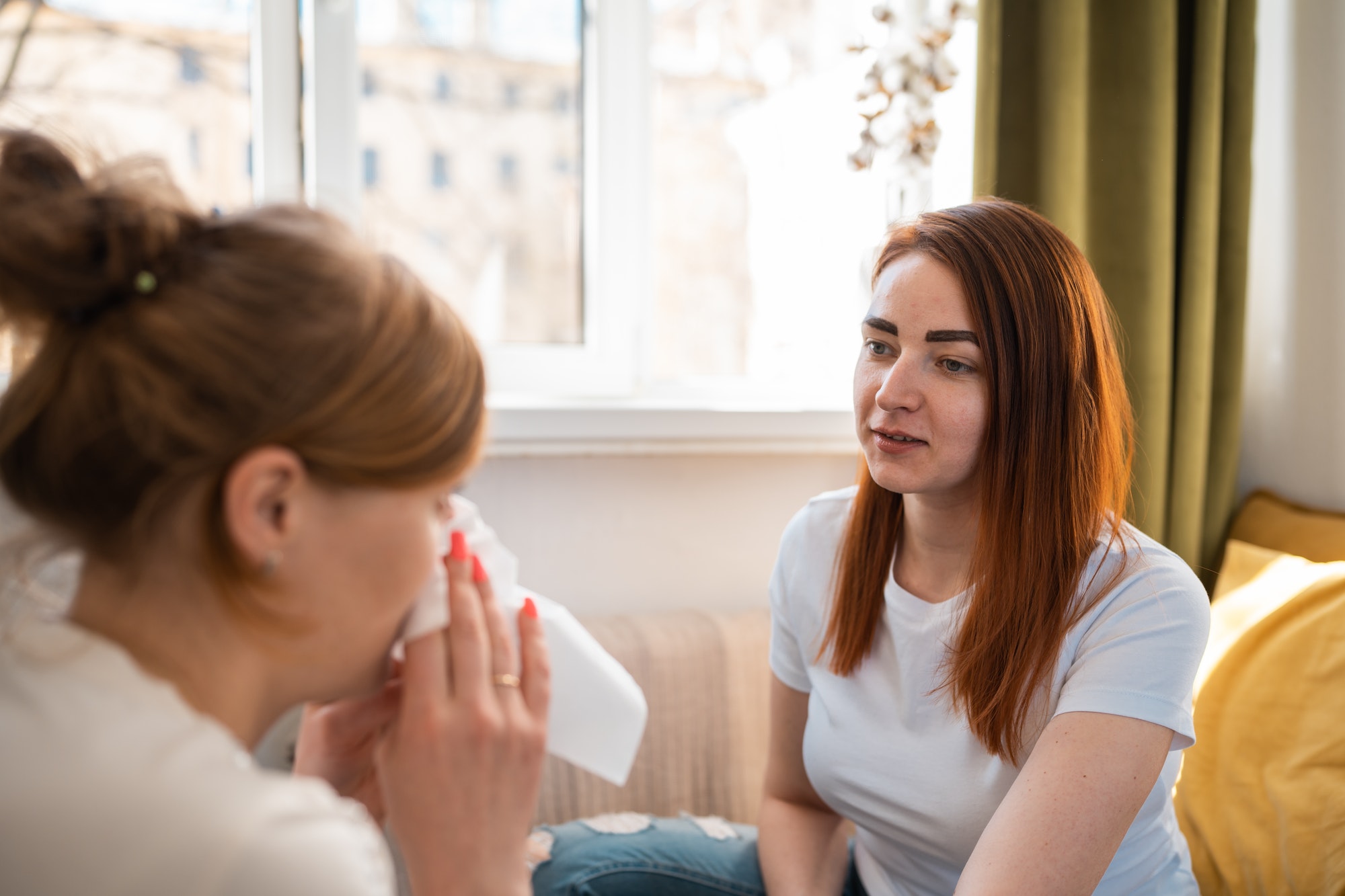 Woman crying at the psychologist office