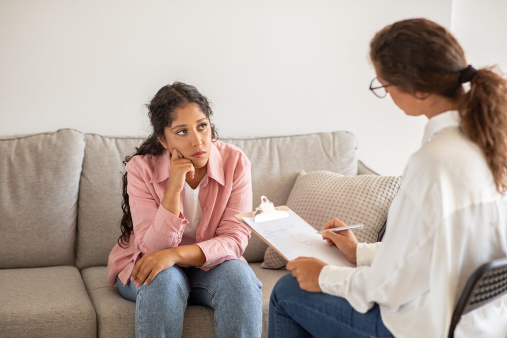 woman talking to therapist