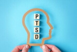 PTSD letters arranged in frame of human head