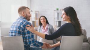 two people at couples counseling with therapist