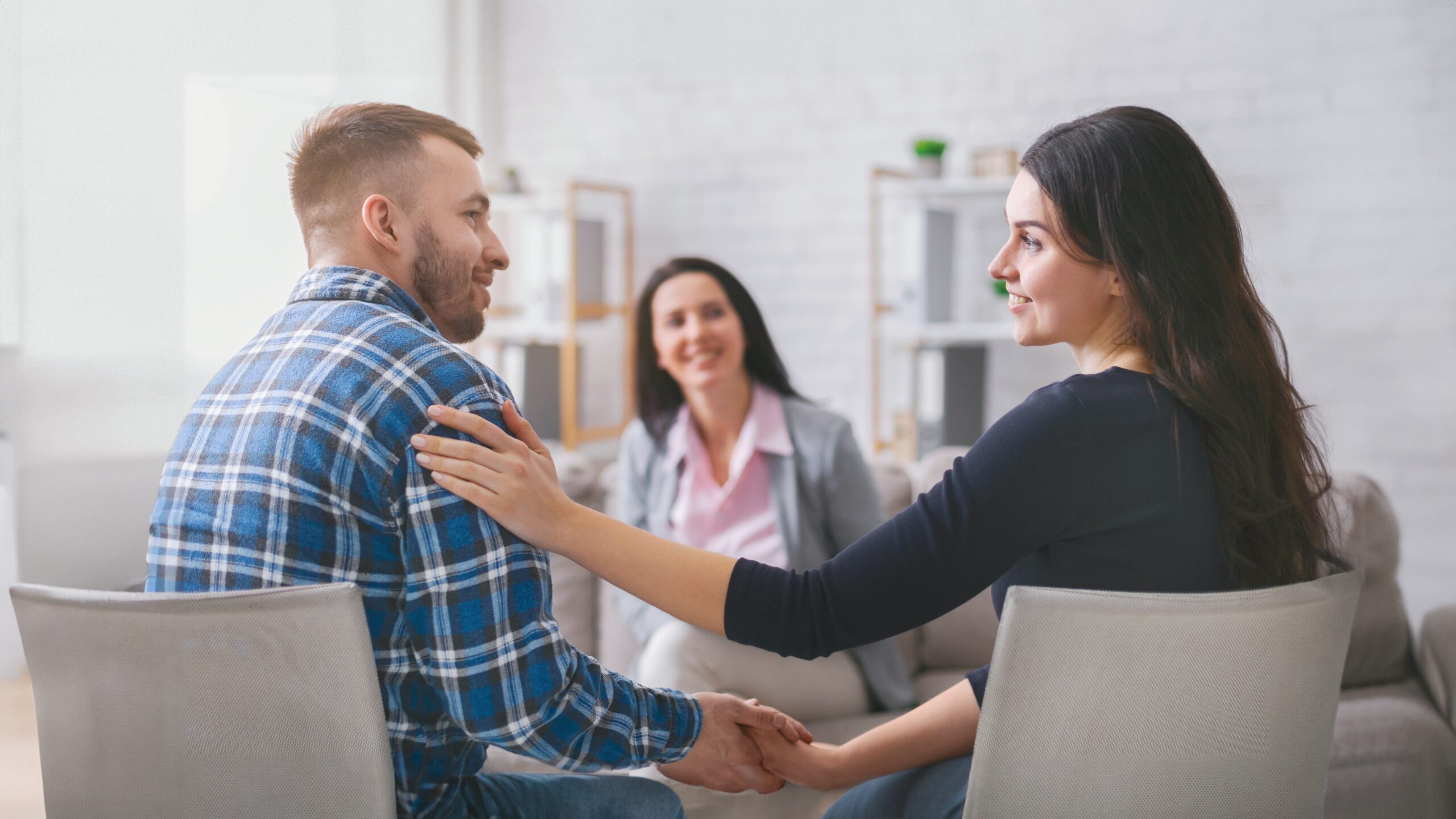 two people at couples counseling with therapist